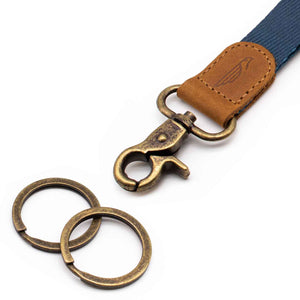 Close up lanyard with 2 vintage metal key rings brown leather navy color fabric