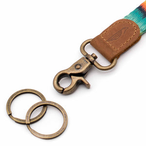 Close up lanyard with 2 gold metal key rings brown leather mint fabric