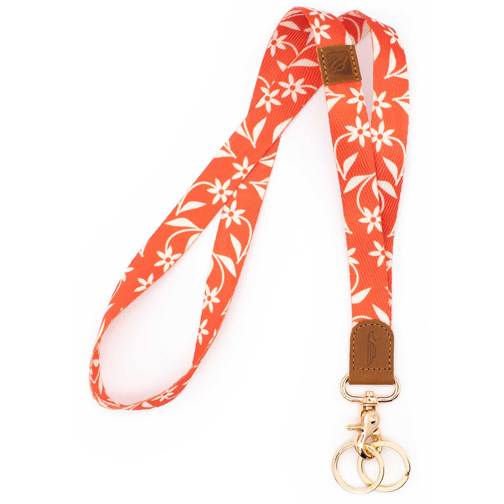 Orange white floral patterned neck lanyard brown leather hardware metal clasp with 2 key rings