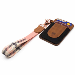 Pink cream plaid hand wrist lanyard with keys and brown leather slim wallet