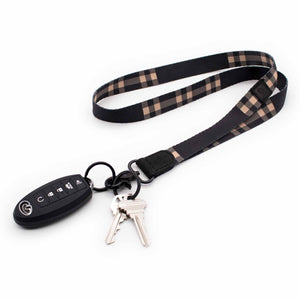 Black and cream color plaid neck lanyard with keys and car key