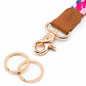 Close up lanyard with 2 gold metal key rings brown leather pink blue color fabric